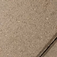 Плитка тротуарная желтого цвета на сером цементе